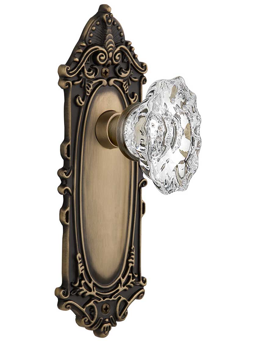 Largo Door Set with Chateau Crystal Glass Knobs in Antique Brass.